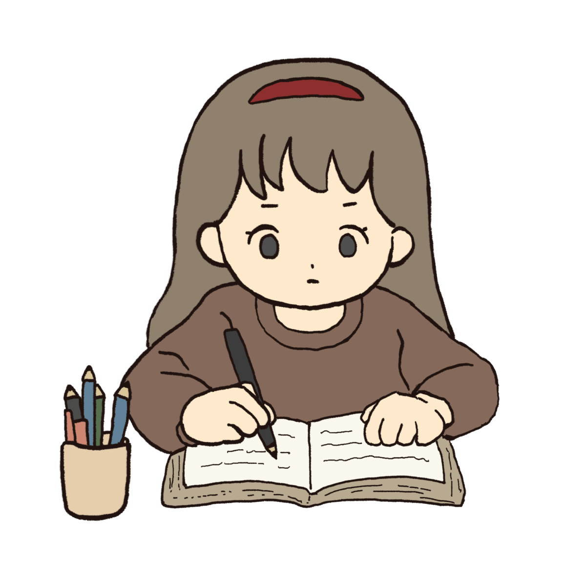 真剣にノートに書き物をする女の子