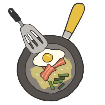 ベーコンエッグを焼いているフライパン