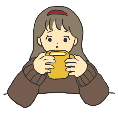 飲み物をフーフーする女の子